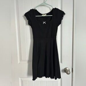 Black Cap Sleeve Dress with Bow Detail
